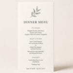 Wedding dinner menu card with greenery