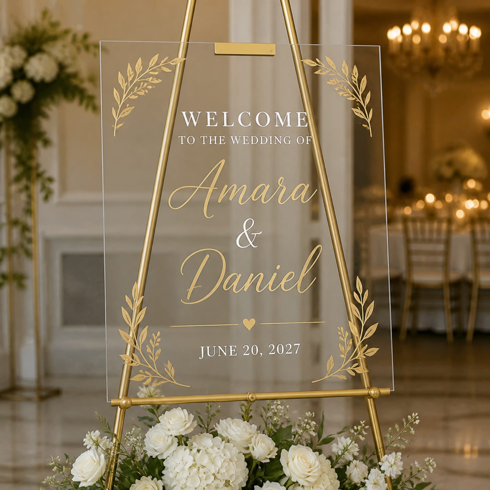 Clear acrylic wedding welcome sign on gold easel