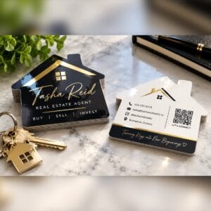House-shaped die-cut business cards for a Brampton real estate agent, black and gold front with white back