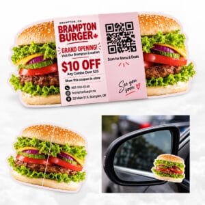 Burger-shaped die-cut wing-fold pop-up business card with coupon and QR code, shown open, folded and hung on a car mirror