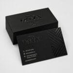 Black business cards with raised spot UV logo