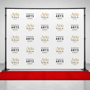 Step and repeat backdrop banner with red carpet