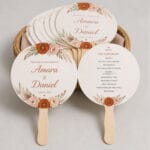 Printed wedding program fans with wooden handles